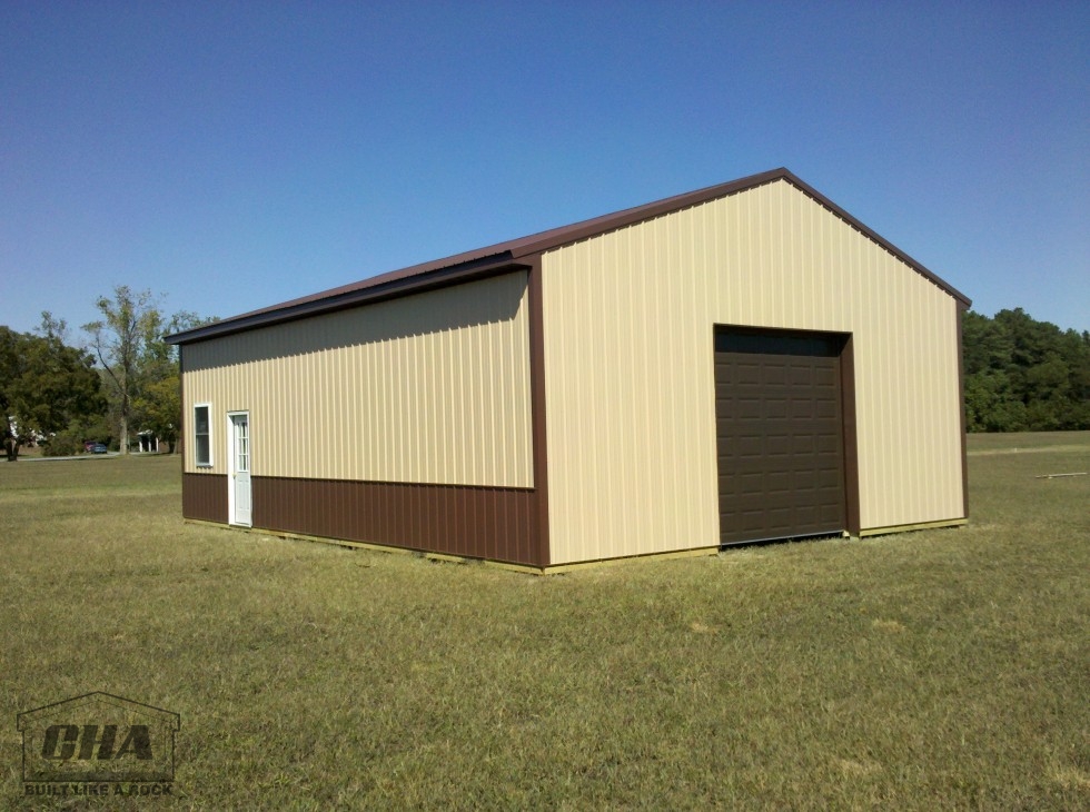 large tan and brown pole barn building